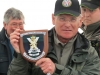 Peter Thomason (TWFFS Chair) with a mounted Regimental Plaque 