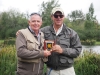 Neil Mundy from JLP receiving a plaque from the Cadet Training Team